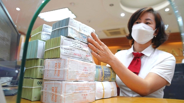 Ngân hàng đổ hàng triệu tỷ vào nhà ở, dòng vốn tiếp tục dồn mạnh vào bất động sản - Ảnh 1.