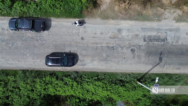 Cận cảnh Quốc lộ 62 chi chít ổ gà, ổ voi: Người dân ngán ngẩm “đi như qua ải” - Ảnh 3.