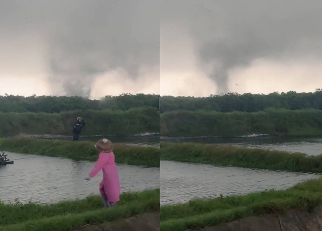 Người nuôi cá hoảng sợ bỏ chạy khi thấy lốc xoáy quét qua ao - Ảnh 1.