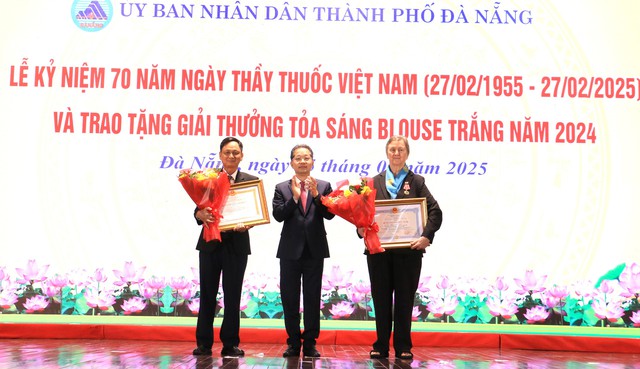 Ms. Virginia Mary Lockett (right cover) received the Friendship Medal for her active contributions to protecting and caring for the health of the Vietnamese people.