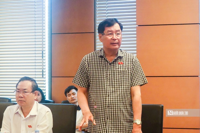 Bộ trưởng Bộ Nội vụ: Giữ ngạch công chức để tạo cơ chế "có vào, có ra"- Ảnh 2. Bộ trưởng Bộ Nội vụ: Giữ ngạch công chức để tạo cơ chế "có vào, có ra"- Ảnh 2.