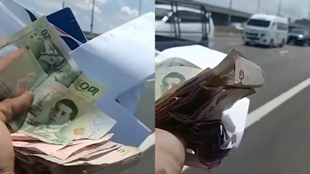 Tiền mặt rơi khắp đường, người dân lao ra thi nhau nhặt- Ảnh 1. Tiền mặt rơi khắp đường, người dân lao ra thi nhau nhặt- Ảnh 1.