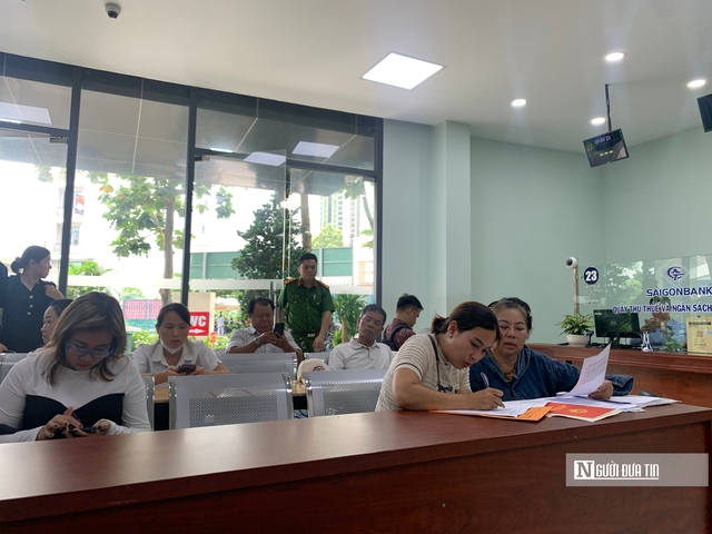 Tp.HCM triển khai việc đăng ký, xoá thế chấp đất đai trong 1 ngày- Ảnh 1. Tp.HCM triển khai việc đăng ký, xoá thế chấp đất đai trong 1 ngày- Ảnh 1.