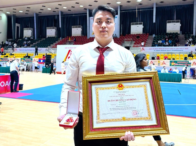 Từ cậu bé mê game đến nhà vô địch thế giới 4 lần, nhận Huân chương Lao động hạng Nhất- Ảnh 1.