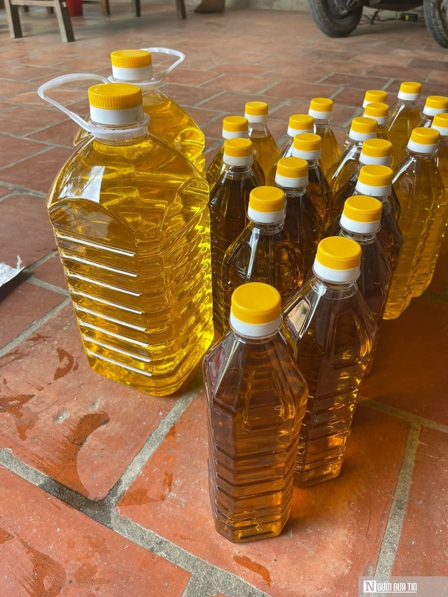 Sợ trên thị trường dầu ăn "bẩn", người dân xứ Nghệ đổ xô đi ép dầu lạc, vừng về dùng - Ảnh 9. Sợ trên thị trường dầu ăn "bẩn", người dân xứ Nghệ đổ xô đi ép dầu lạc, vừng về dùng - Ảnh 9.