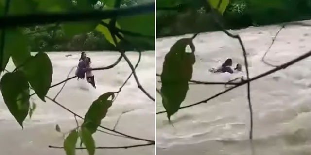 Băng qua dòng sông để về nhà, 2 học sinh bị lũ cuốn trôi - Ảnh 1.