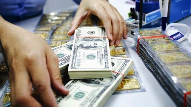 Vàng và USD hạ nhiệt sau loạt biện pháp điều hành- Ảnh 2.