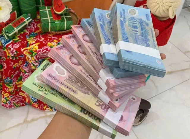 Đổi tiền mới dịp Tết 2026 như thế n&agrave;o để kh&ocirc;ng bị phạt l&ecirc;n tới 40 triệu đồng? - Ảnh 1.