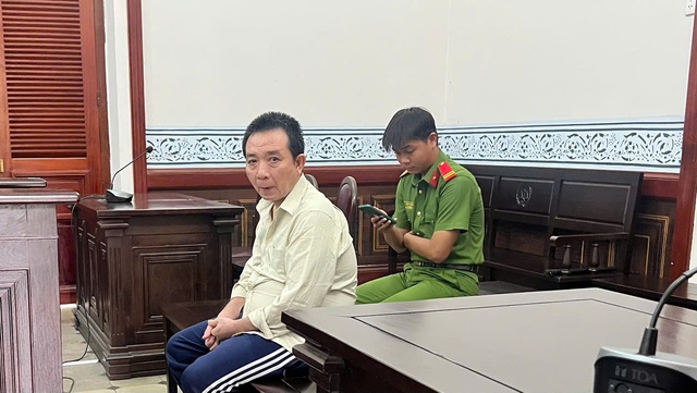 Lý do hoãn xử đối với cLý do hoãn xử đối với giám đốc chiếm đoạt tiền tỷ rồi bỏ trốn 22 năm - Ảnh 1.