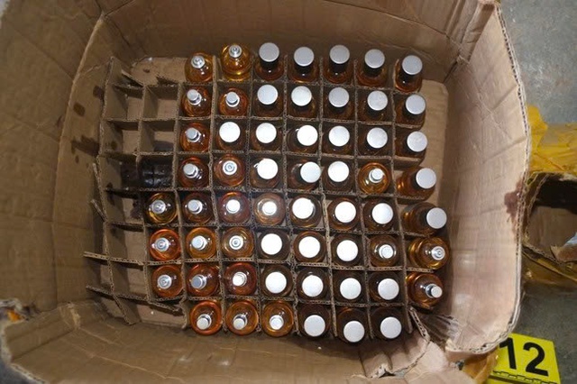 Truy t&igrave;m người bị hại trong đường d&acirc;y sản xuất nước hoa giả trị gi&aacute; h&agrave;ng chục tỷ đồng tại Đồng Nai- Ảnh 2.