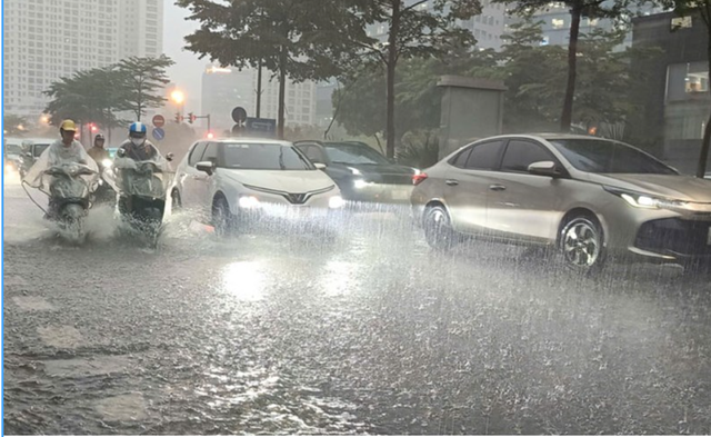 Mưa d&ocirc;ng phủ k&iacute;n miền Bắc trước kỳ nghỉ lễ 30/4, nguy cơ lốc s&eacute;t k&egrave;m mưa đ&aacute; - Ảnh 1.