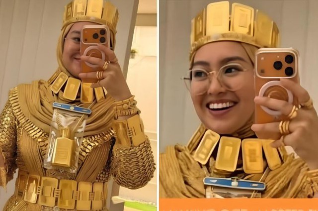 Cô dâu gây sốc khi "phủ" vàng từ đầu đến chân- Ảnh 1. Cô dâu gây sốc khi "phủ" vàng từ đầu đến chân- Ảnh 1.