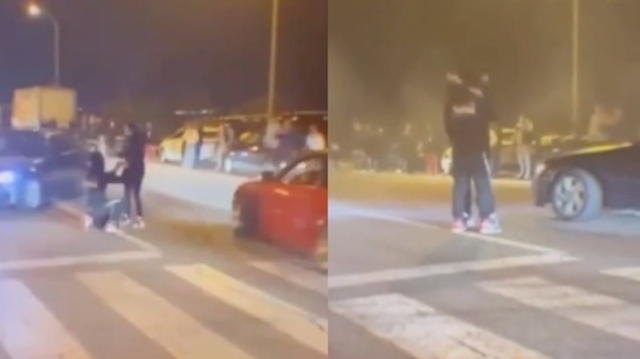 Quỳ gối cầu hôn bạn gái giữa phố, người đàn ông bị ô tô đâm trúng - Ảnh 1.