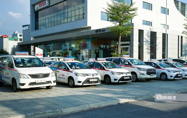 Bộ Tài chính phản hồi việc taxi kêu khó vì phải lập hóa đơn điện tử từng chuyến xe - Ảnh 1.