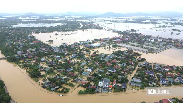 Mưa lũ chưa từng có khiến 8.419 hộ ở Thanh Hóa ngập lụt, nhiều tuyến đường bị chia cắt- Ảnh 1.