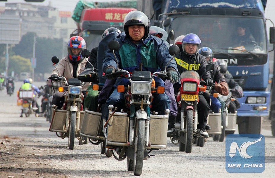 Trung Quốc: Cuộc 'đại di dân' khổng lồ về quê ăn Tết dài 1,2 tỉ km