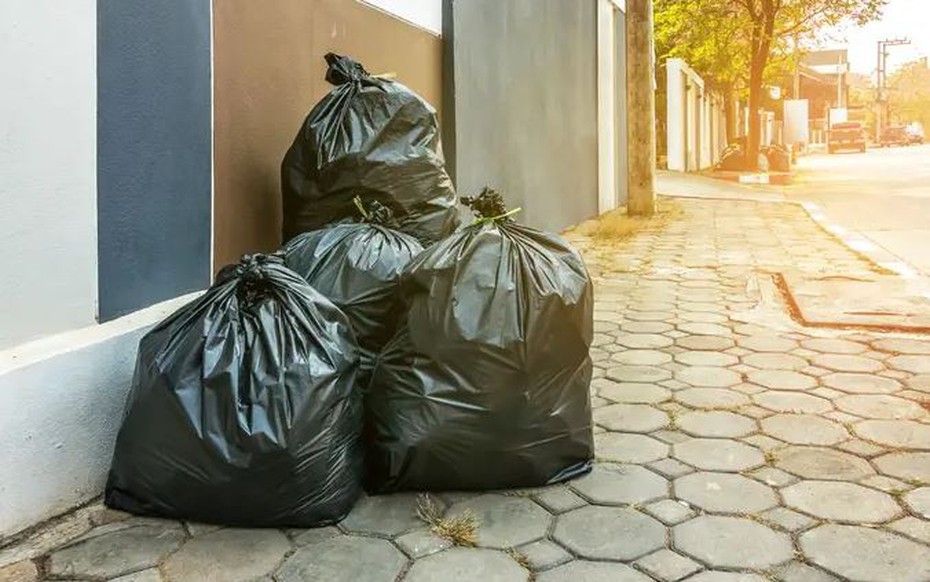 Phát hiện nhiều bó tiền mặt trị giá 432 triệu đồng trong túi rác gần toà biệt thự