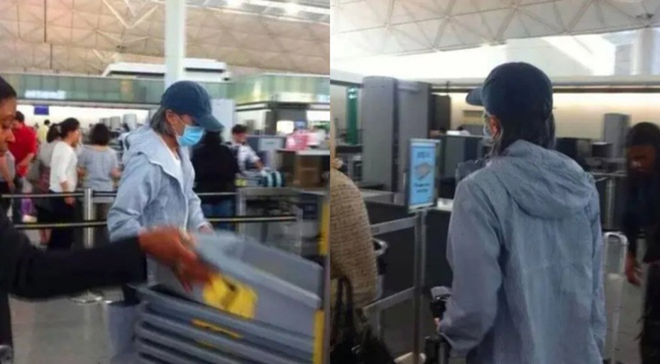 Sau ồn ào nợ nần Châu Tinh Trì một mình ra sân bay không có trợ lý hay người thân đi cùng