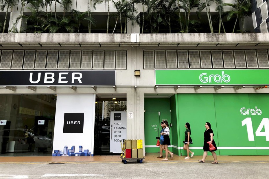 Vụ Grab mua lại Uber có thể áp dụng luật Cạnh tranh mới để xử lý