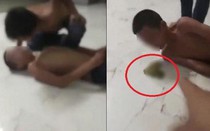 Người bố ép con nhổ nước bọt vào miệng nhau bất hợp tác với cơ quan chức năng