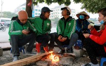 Cận cảnh người dân Hà Nội co ro trong thời tiết rét đậm 12 độ C