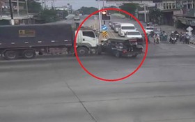 Vượt đèn đỏ, xe đầu kéo đâm trúng xe buýt chở học sinh
