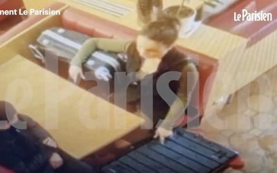 Người phụ nữ mở chiếc vali chứa "bí mật đáng sợ" ngay trong quán bar