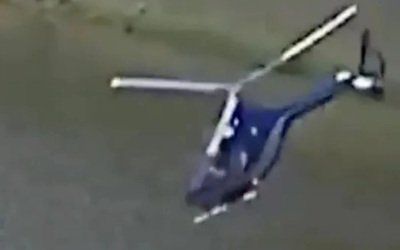 Kinh hoàng trực thăng rơi xuống hồ, suýt trúng nhóm người câu cá