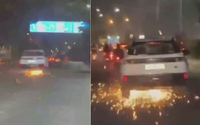 Gây tai nạn bỏ chạy, tài xế ô tô kéo lê xe máy tóe lửa trên đường