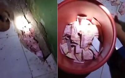 Chủ nhà sốc nặng khi đào được cả xô tiền mặt trong tường
