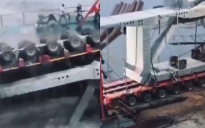 Dầm cầu khổng lồ rơi xuống sông, nhiều người may mắn thoát chết