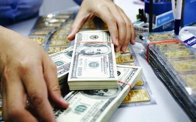 Vàng và USD hạ nhiệt sau loạt biện pháp điều hành