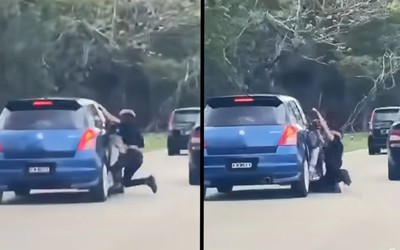 Người đàn ông bám vào xe ô tô của vợ cũ suốt 2km