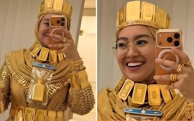 Cô dâu gây sốc khi "phủ" vàng từ đầu đến chân