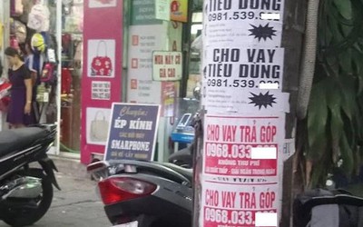 Từ 15/5, dán, vẽ sản phẩm quảng cáo trên cột điện bị phạt đến 20 triệu đồng