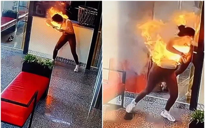Đang dùng điện thoại, cô gái "sốc" vì lửa bao trùm mặt