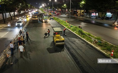 Hà Nội: Xuyên đêm thảm lại mặt đường Võ Chí Công