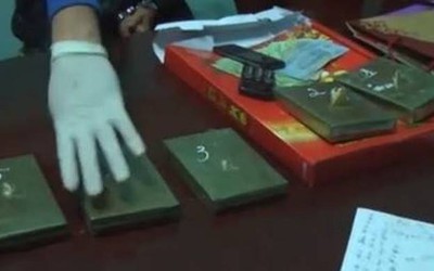 Bắt "nữ quái" vận chuyển 5 bánh heroin