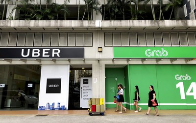 Vụ Grab mua lại Uber có thể áp dụng luật Cạnh tranh mới để xử lý