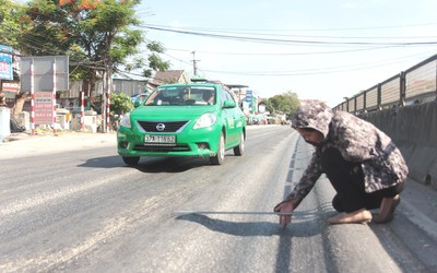 Quốc lộ nghìn tỷ vá víu chằng chịt, hằn lún vệt "luống khoai"